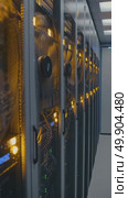 Rows of illuminated servers in a data center with dynamic lighting and cooling systems. Стоковое AI-видео, аниматор Владимир Федоров / Фотобанк Лори