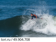 Bodyboarder in action on the ocean waves on a sunny day. Стоковое фото, агентство Ingram Publishing / Фотобанк Лори