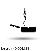 Cigarette in an ashtray icon. White background with shadow design. Vector illustration. Стоковая иллюстрация, агентство Ingram Publishing / Фотобанк Лори