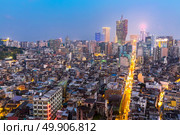 Macau cityscape skyline at dusk. Mocau now is part of China. Стоковое фото, агентство Ingram Publishing / Фотобанк Лори