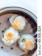 Chinese dim sum Hagao with scallop - Steamed Chinese groumet cuisine. Стоковое фото, агентство Ingram Publishing / Фотобанк Лори