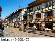 Street with historical half-timbered houses in Petite France district in Strasbourg, France. Стоковое фото, агентство Ingram Publishing / Фотобанк Лори