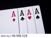 ace four of a kind poker card on dark black background. Стоковое фото, агентство Ingram Publishing / Фотобанк Лори