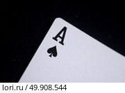ace of spade poker card on dark black background. Стоковое фото, агентство Ingram Publishing / Фотобанк Лори