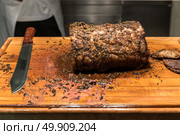 Carving of Wagyu beef roast. Стоковое фото, агентство Ingram Publishing / Фотобанк Лори