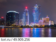 Macau cityscape skyline at dusk. Mocau now is part of China. Стоковое фото, агентство Ingram Publishing / Фотобанк Лори