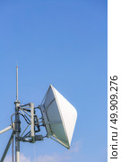 Big telecommunication satellite and radio transmitter. Стоковое фото, агентство Ingram Publishing / Фотобанк Лори