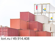 Cargo Containers Stack at the Pier docks. Стоковое фото, агентство Ingram Publishing / Фотобанк Лори