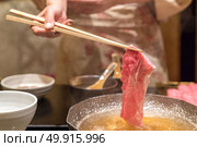 matsusaka beef A5 Wagyu Beef Shabu shabu with steam, Groumet Japanese hot pot cuisine. Стоковое фото, агентство Ingram Publishing / Фотобанк Лори