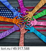 American diversity holding as diverse hands made of crumpled paper connected together as a concept for citizen solidarity and patriotic friendship in the united states, Стоковое фото, агентство Ingram Publishing / Фотобанк Лори