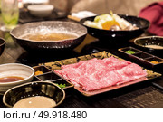 matsusaka beef A5 Wagyu Beef Shabu shabu Set with steam, Groumet Japanese hot pot cuisine. Стоковое фото, агентство Ingram Publishing / Фотобанк Лори