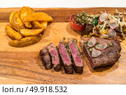 Grilled Grain fed Grilled Australian Wagyu Beef with fried potato wedge. Стоковое фото, агентство Ingram Publishing / Фотобанк Лори