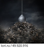Urban renewal and destruction or demolition of old architecture with a wrecking ball on ruins as a concept to make way for new construction and industrial and city planning with 3D render elements. Стоковое фото, агентство Ingram Publishing / Фотобанк Лори
