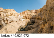 A pool of natural sea water between sandstone cliffs at Algar Seco. Carvoeiro Algarve Portugal. Стоковое фото, агентство Ingram Publishing / Фотобанк Лори