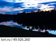 landscape sunset over the tropical lake in Thailand. Стоковое фото, агентство Ingram Publishing / Фотобанк Лори
