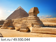 Sphinx and pyramid in the egyptian desert. Стоковое фото, агентство Ingram Publishing / Фотобанк Лори