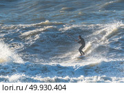 Kiteboarder enjoy surfing on a sunny day. Стоковое фото, агентство Ingram Publishing / Фотобанк Лори