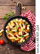 Minestrone soup. Vegetable soup with fresh tomato, celery, carrot, zucchini, onion, pepper, beans and pasta. Dish of italian cuisine. Стоковое фото, агентство Ingram Publishing / Фотобанк Лори