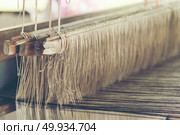 old weaving loom - closeup - photo, vintage filter image. Стоковое фото, агентство Ingram Publishing / Фотобанк Лори
