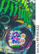 Fresh Rolls with rice noodles wrapped in lettuce and rice paper with thai herbs, cucumber, marinated carrot and banana flower with with peanut sauce is shown. Стоковое фото, агентство Ingram Publishing / Фотобанк Лори