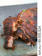 Smoke grilled pork ribs BBQ. Smoke Pork Rib BBQ. Стоковое фото, агентство Ingram Publishing / Фотобанк Лори