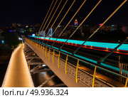 Halic Metro Bridge in Istanbul at night, Turkey. Стоковое фото, агентство Ingram Publishing / Фотобанк Лори