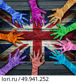 British diversity as diverse hands made of crumpled paper connected together as a concept for Britain citizen solidarity and patriotic friendship in the United Kingdom in a 3D illustration style. Стоковое фото, агентство Ingram Publishing / Фотобанк Лори