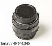 50 mm lens on white background. Стоковое фото, агентство Ingram Publishing / Фотобанк Лори