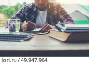 Hipster Businessman Working writing Determine Workspace Lifestyl. Hipster Businessman Working writing Determine Workspace Lifestyle Concept. Стоковое фото, агентство Ingram Publishing / Фотобанк Лори