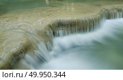 part of Erawan Waterfall, Kanchanaburi, Thailand. Стоковое фото, агентство Ingram Publishing / Фотобанк Лори