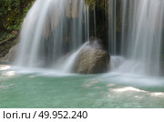 Deep forest Waterfall in Kanchanaburi, Thailand. Стоковое фото, агентство Ingram Publishing / Фотобанк Лори