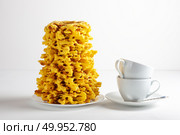 Traditional Lithuanian Sakotis cake on a white plate. Стоковое фото, фотограф Елена Дмитриева / Фотобанк Лори