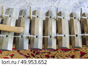 Traditional Balinese orchestra Gamelan - metallophones, brass gongs and other musical percussion instruments. Arts, Music and culture of Bali island and Indonesian people and asian travel backgrounds. Стоковое фото, агентство Ingram Publishing / Фотобанк Лори