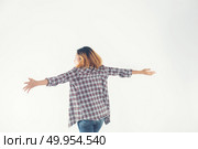 Freedom young hipster woman raising hands with isolated over a w. Freedom young hipster woman raising hands with isolated over a white background. Стоковое фото, агентство Ingram Publishing / Фотобанк Лори