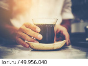 close-up of hand drip coffee. Стоковое фото, агентство Ingram Publishing / Фотобанк Лори