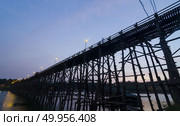 The old wooden bridge Bridge collapse Bridge across the river and Wood bridge (Mon bridge )at sangklaburi, kanchanaburi, Province Asia thailand. Стоковое фото, агентство Ingram Publishing / Фотобанк Лори