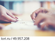 Finally finding solution concept with jigsaw. Стоковое фото, агентство Ingram Publishing / Фотобанк Лори