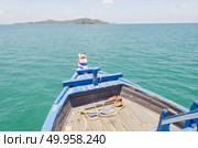 Ship Nose Front View Long tail boat at Phi Phi Islands sea Asia Thailand. Стоковое фото, агентство Ingram Publishing / Фотобанк Лори