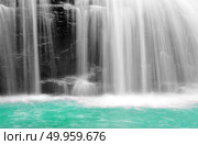 part of a waterfall taken with a slow shutter speed to smooth the water. part of a waterfall taken with a slow shutter speed to smooth th. Стоковое фото, агентство Ingram Publishing / Фотобанк Лори