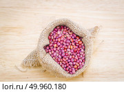 stilllife picture of nuts beans on wooden floor. Стоковое фото, агентство Ingram Publishing / Фотобанк Лори