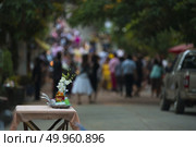 SANGKLABURI - November 19, 2016 : Thai people donated food to the monks in Sankaburi,Thailand on November 19, 2016. Sanklaburi is popular town for the tourism in Thailand. Редакционное фото, агентство Ingram Publishing / Фотобанк Лори