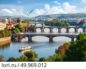 Row of bridges in Prague at summer day. Стоковое фото, агентство Ingram Publishing / Фотобанк Лори