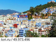 Picturesque view of city of blue Chefchaouen on a sunny summer day. Morocco. Стоковое фото, фотограф Евгений Ткачёв / Фотобанк Лори