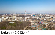 Panoramic view of the city with modern houses and a park, Dorogozhychi distric with a TV tower in the distance. Kiev, Ukraine. Drone photography from aerial view. Panoramic view of the city of Kiev with modern houses and a park, Kiev, Ukraine, aerial view. Стоковое фото, агентство Ingram Publishing / Фотобанк Лори