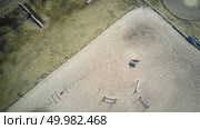 Aerial drone bird’s eye view of Kiev city public Hippodrome facilities located with horse is on it, Ukraine. horse racing hippodrome aerial photo shooting from a drone in Kyiv city, Ukraine. Редакционное фото, агентство Ingram Publishing / Фотобанк Лори