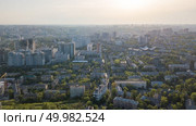 Aerial photography from the drone, bird’s eye view to the Kiev old building with green spaces and the newly built houses, a new microdistrict of the city at sunset in the summer.. A bird’s eye view, panoramic view from the drone to the Pechersk district in the city of Kiev, Ukraine. Стоковое фото, агентство Ingram Publishing / Фотобанк Лори