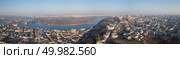 Panorama of kyiv, District Podol and St. Andrew’s Church, Pochtovaya Ploschyad and the Dnieper River with Peshihodny and Podolsky bridges, left bank in the distance, Ukraine. Drone photo Full panorama 360. Panorama of Kiev, District Podol and the left bank, the Dnieper River on an April sunny day, Ukraine. Стоковое фото, агентство Ingram Publishing / Фотобанк Лори