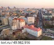 Aerial photography from the drone to the National Sanctuary Complex Kyiv Sophia and other historical places in Kiev, Ukraine, a shot at sunset in the summer.. Panoramic aerial view from the drone, a view of the bird’s eye view of the the central historical part of the city of Kiev, Ukraine, with old buildings of the city. Стоковое фото, агентство Ingram Publishing / Фотобанк Лори