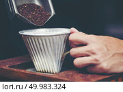 coffee dripping filter process, vintage filter image. Стоковое фото, агентство Ingram Publishing / Фотобанк Лори