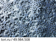 Christmas, New Year blue background with snowflakes. Winter background from snowflakes. Стоковое фото, агентство Ingram Publishing / Фотобанк Лори